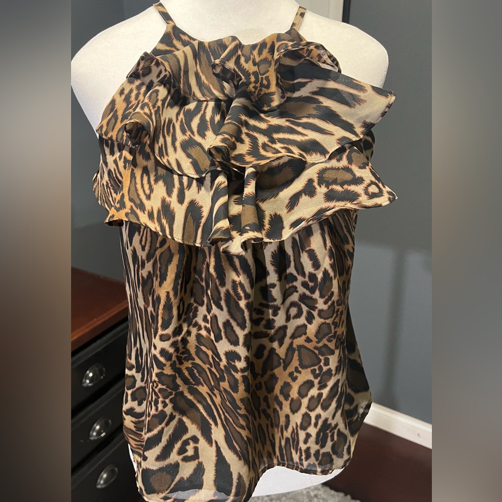 - Nine West animal print sleeveless top. Fully lined and perfect for any o…